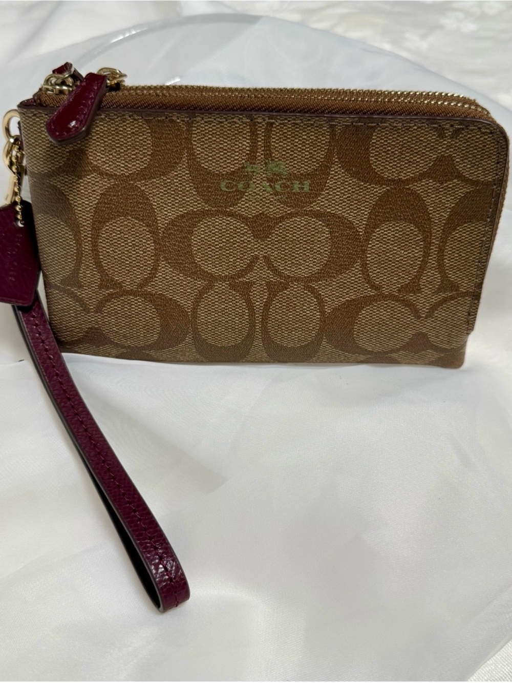 Coach Brown Signature Canvas Wristlet with Burgundy Strap